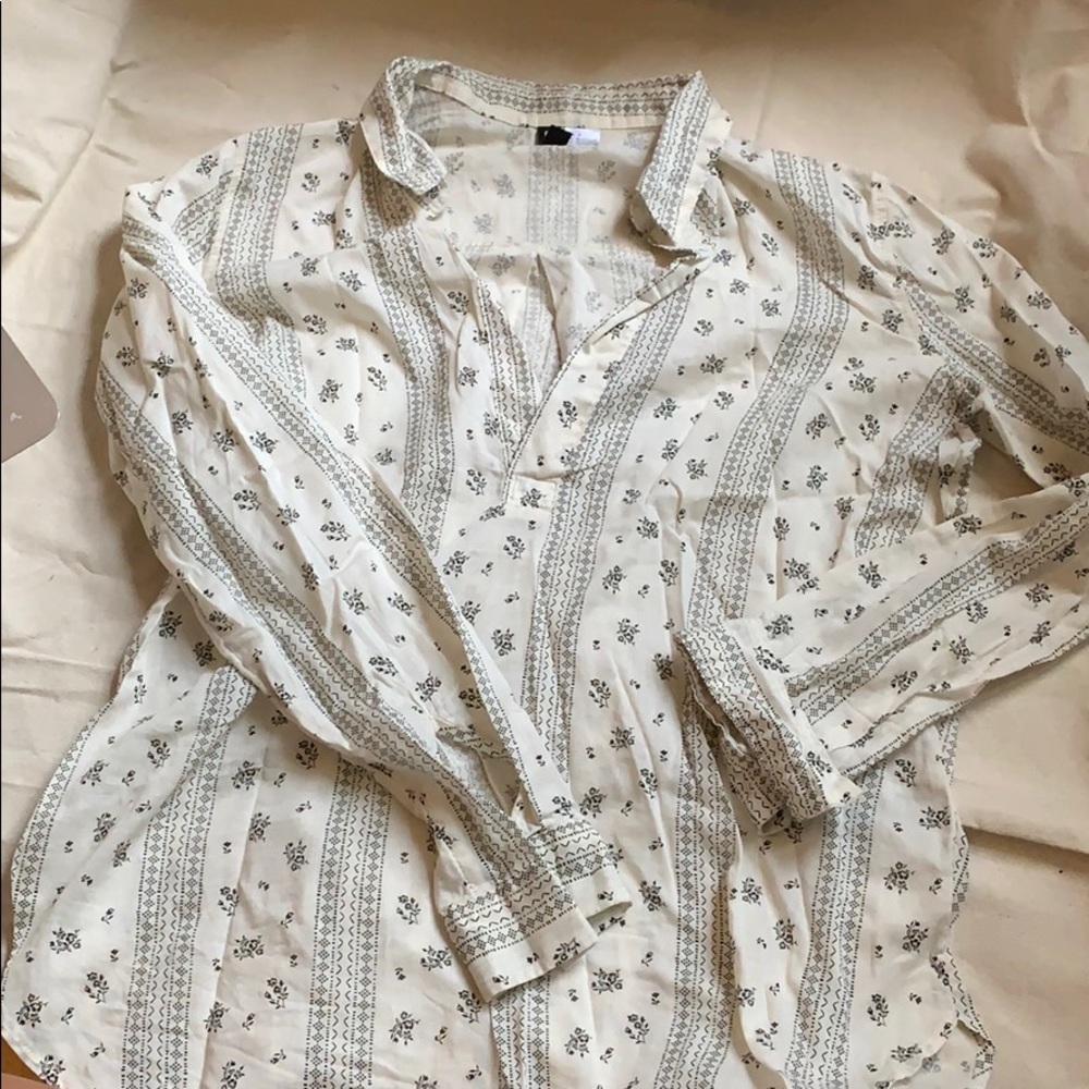 black and cream blouse